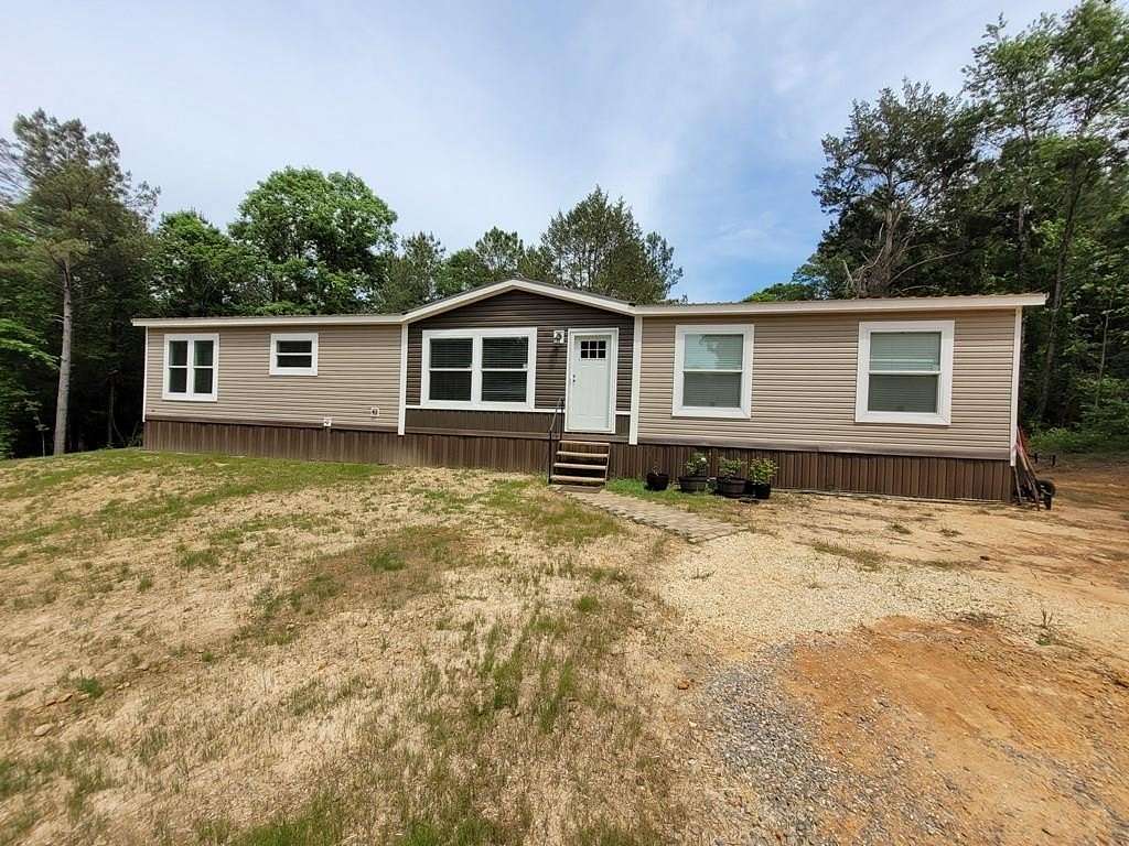 9 Acres of Land with Home for Sale in Heidelberg, Mississippi