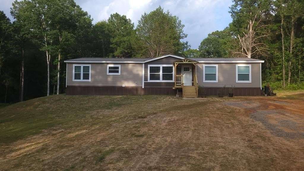 9 Acres of Land with Home for Sale in Heidelberg, Mississippi