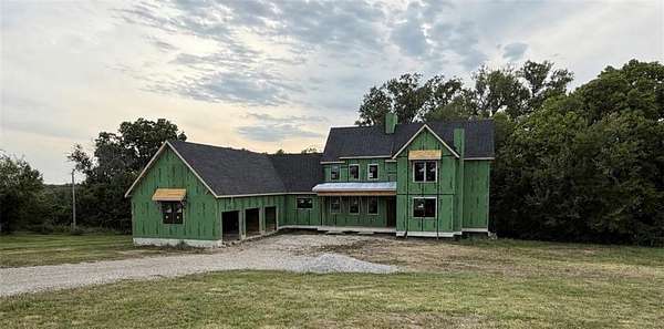 10 Acres of Land with Home for Sale in Buckner, Missouri