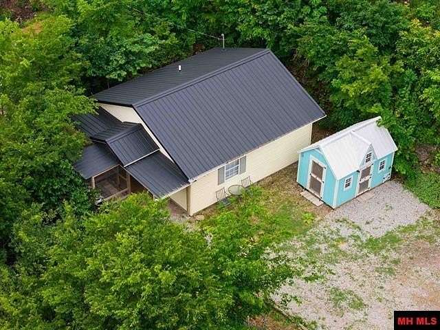 8.64 Acres of Land with Home for Sale in Norfork, Arkansas