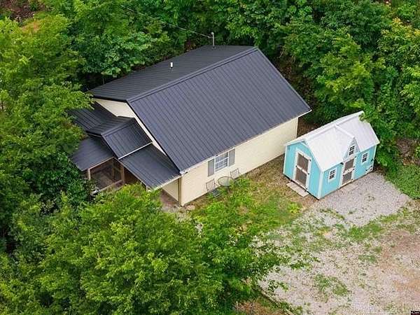 8.64 Acres of Land with Home for Sale in Norfork, Arkansas