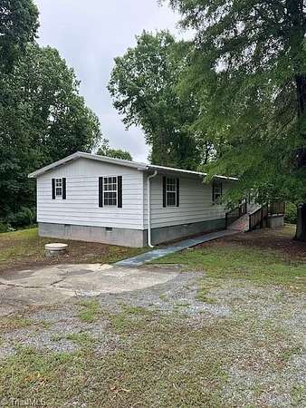 6.32 Acres of Land with Home for Sale in Clemmons, North Carolina