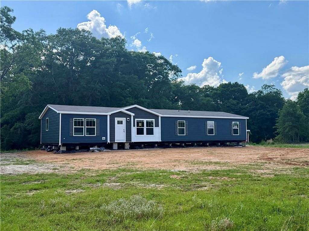 9 Acres of Land with Home for Sale in Seale, Alabama