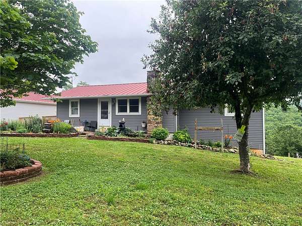 31.7 Acres of Land with Home for Sale in Flippin, Arkansas