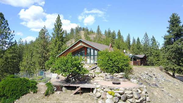 445 Acres of Recreational Land with Home for Sale in Nine Mile Falls, Washington