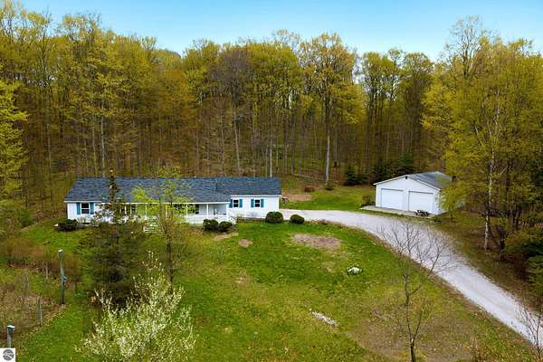 3.8 Acres of Land with Home for Sale in Beulah, Michigan