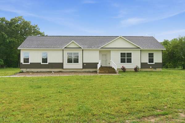 54.7 Acres of Land with Home for Sale in Fair Play, Missouri