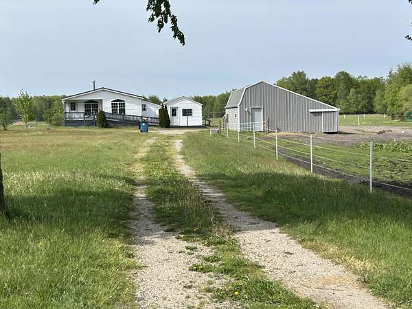 5 Acres of Land with Home for Sale in Fremont, Michigan