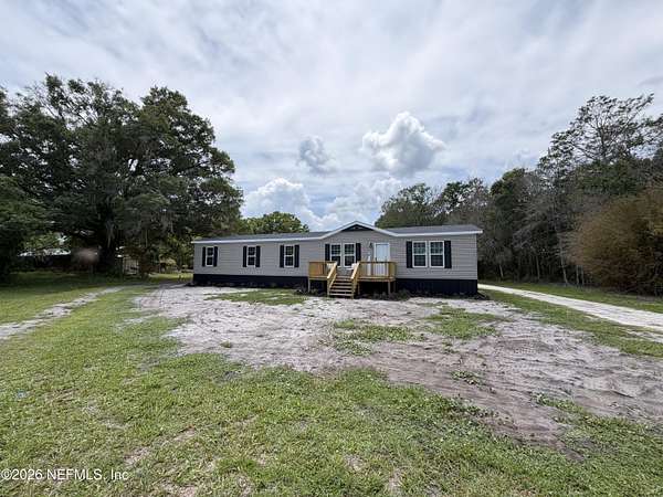 11.1 Acres of Land with Home for Sale in Starke, Florida