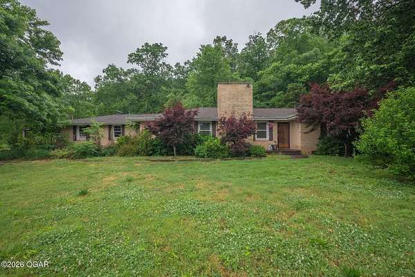 62 Acres of Recreational Land with Home for Sale in Noel, Missouri