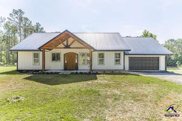 20.3 Acres of Recreational Land with Home for Sale in Lizella, Georgia