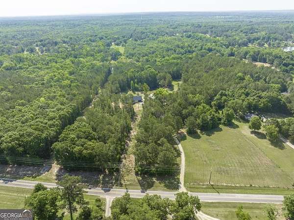 20.3 Acres of Recreational Land with Home for Sale in Lizella, Georgia