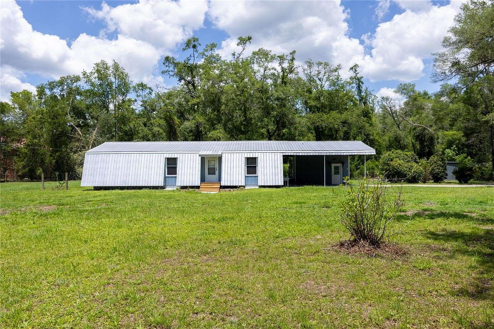 1.69 Acres of Land with Home for Sale in Alachua, Florida