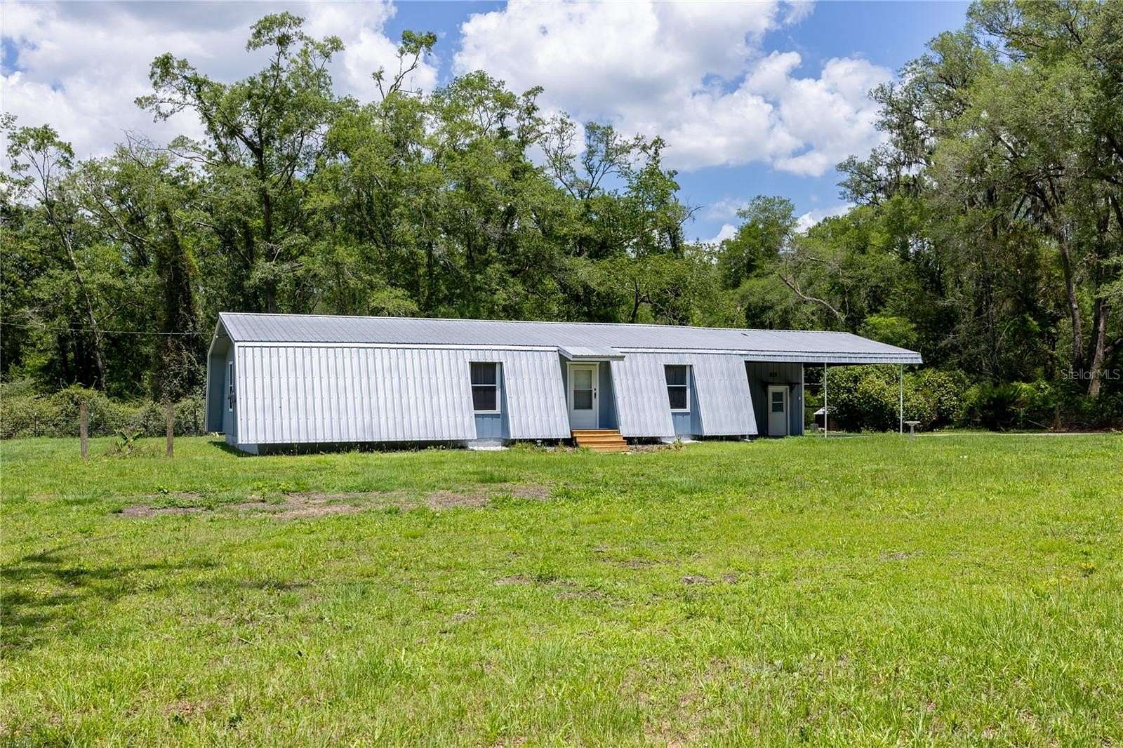 1.69 Acres of Land with Home for Sale in Alachua, Florida