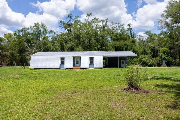 1.69 Acres of Land with Home for Sale in Alachua, Florida