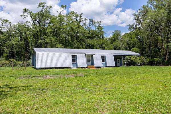 1.69 Acres of Land with Home for Sale in Alachua, Florida