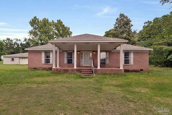 4.79 Acres of Land with Home for Sale in Cantonment, Florida