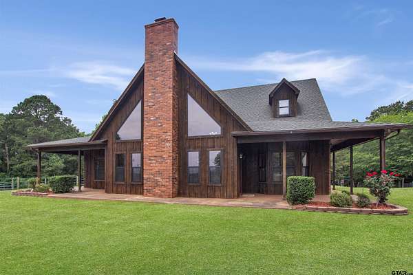 16.1 Acres of Recreational Land with Home for Sale in Hallsville, Texas
