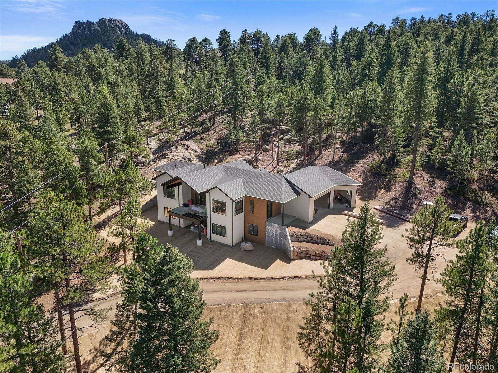 1.67 Acres of Land with Home for Sale in Evergreen, Colorado