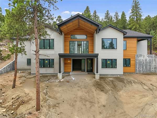 1.67 Acres of Land with Home for Sale in Evergreen, Colorado
