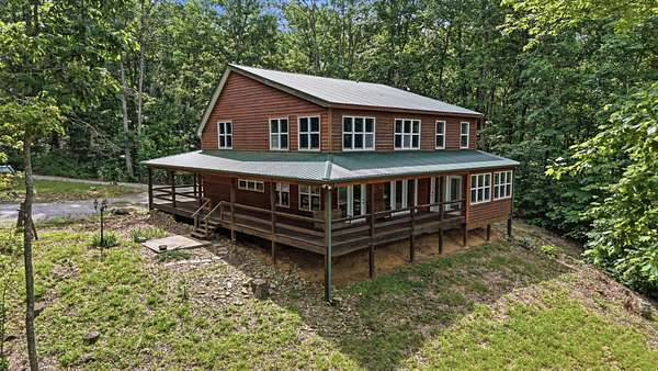 10.4 Acres of Land with Home for Sale in Altamont, Tennessee
