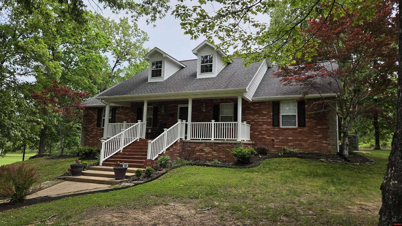 3.7 Acres of Land with Home for Sale in Flippin, Arkansas