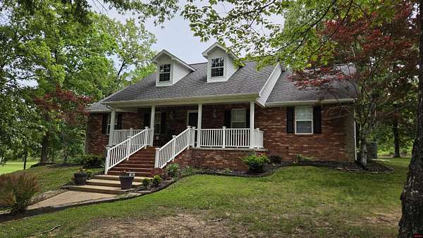 3.7 Acres of Land with Home for Sale in Flippin, Arkansas