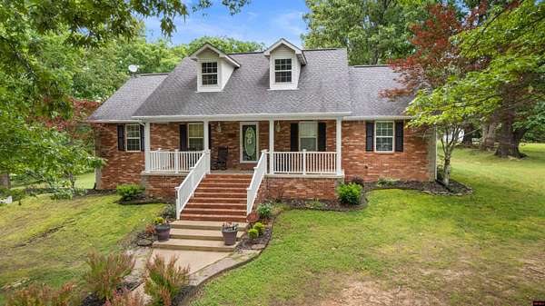 3.7 Acres of Land with Home for Sale in Flippin, Arkansas