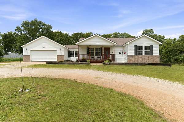 5.27 Acres of Land with Home for Sale in Marshfield, Missouri
