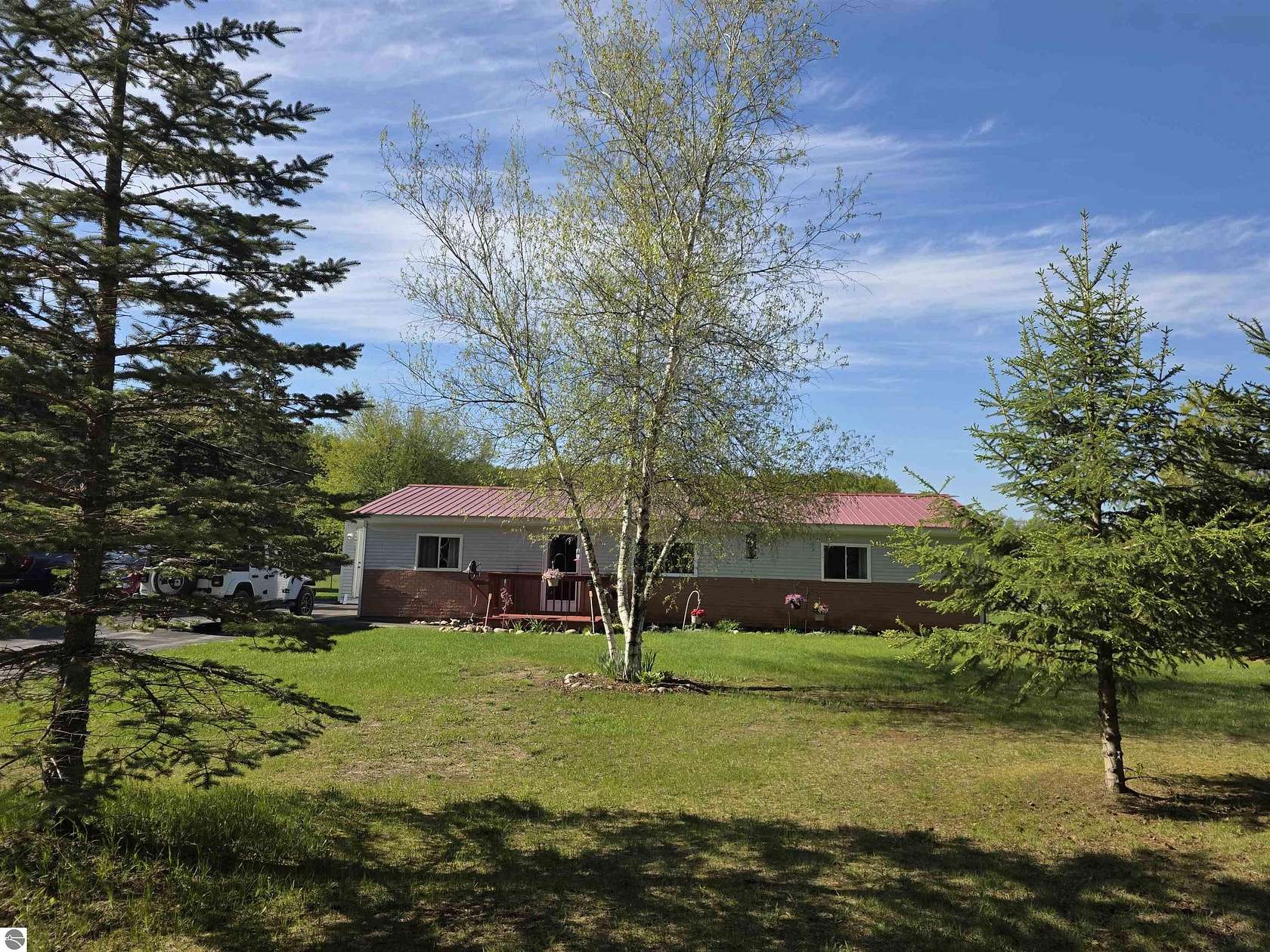 5 Acres of Land with Home for Sale in Kalkaska, Michigan