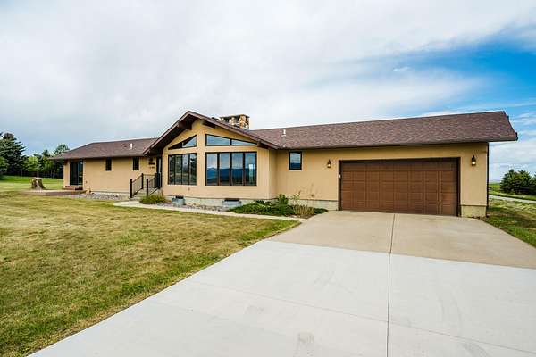 2 Acres of Land with Home for Sale in Sheridan, Wyoming