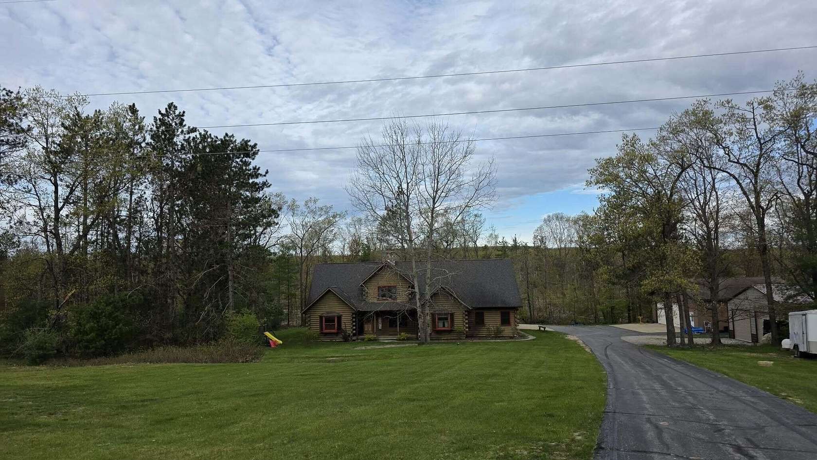 21 Acres of Recreational Land with Home for Sale in Spruce, Michigan