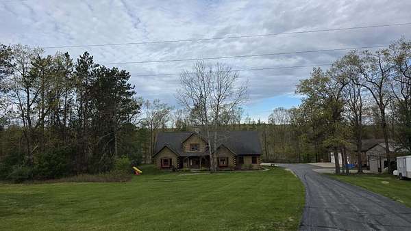 21 Acres of Recreational Land with Home for Sale in Spruce, Michigan
