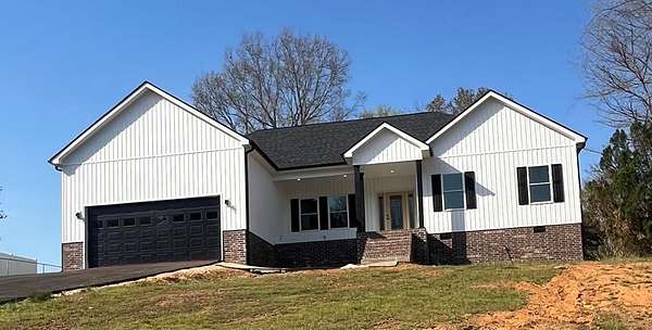67 Acres of Land with Home for Sale in Paris, Tennessee