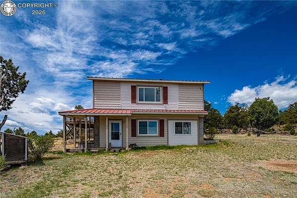 36.3 Acres of Recreational Land with Home for Sale in Cotopaxi, Colorado