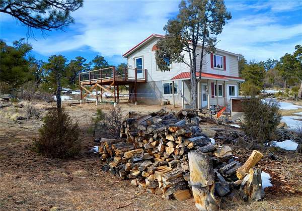 36.3 Acres of Recreational Land with Home for Sale in Cotopaxi, Colorado