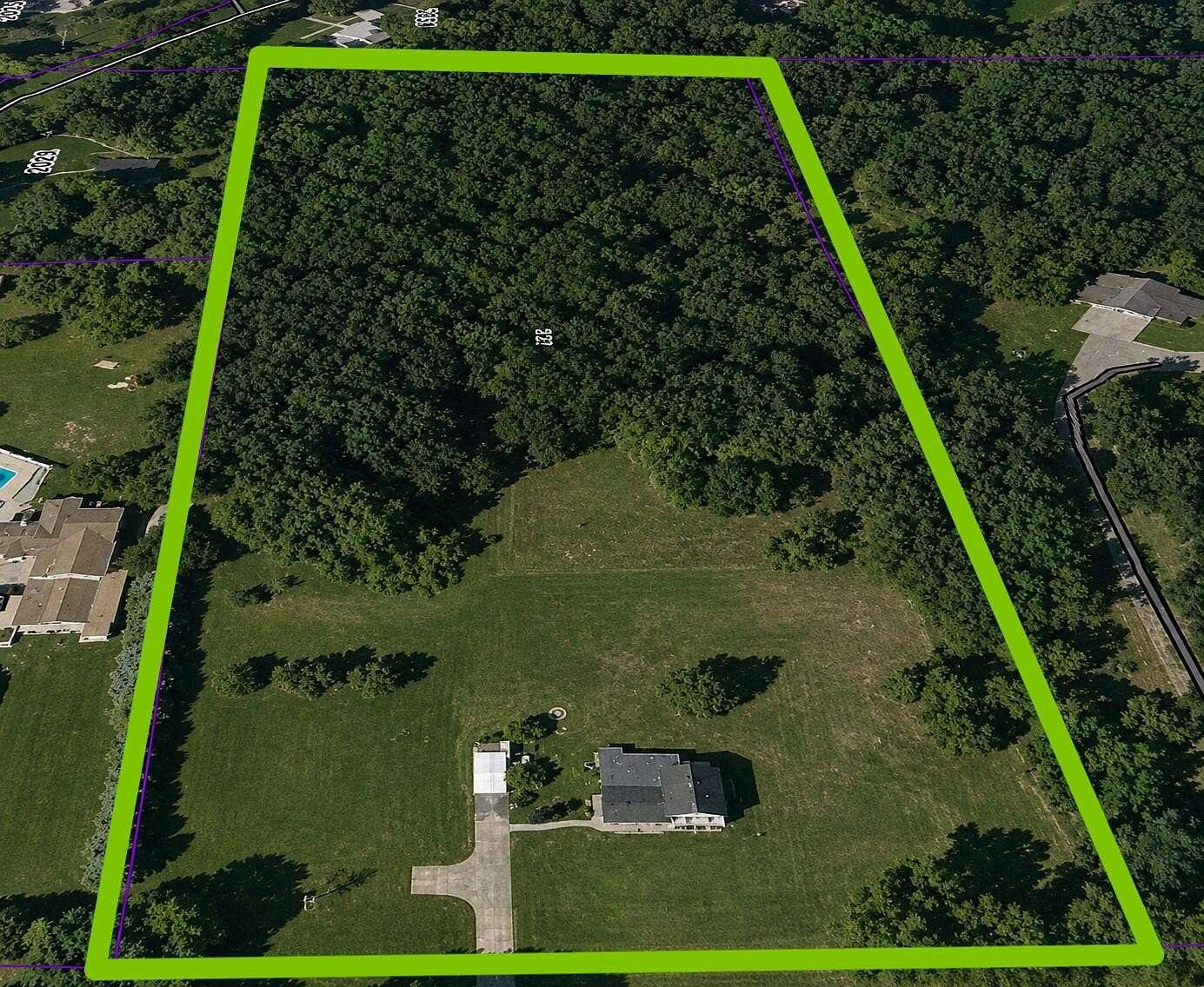 6.84 Acres of Land with Home for Sale in Alto, Michigan