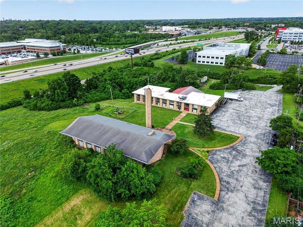 10.7 Acres of Improved Mixed-Use Land for Sale in Cool Valley, Missouri