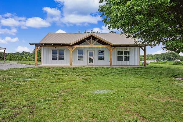 1.69 Acres of Land with Home for Sale in Lawrenceburg, Tennessee