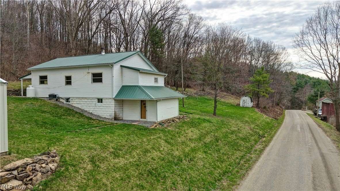 1.57 Acres of Land with Home for Auction in Newcomerstown, Ohio
