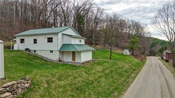 1.57 Acres of Land with Home for Auction in Newcomerstown, Ohio