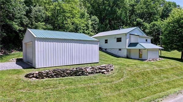 1.57 Acres of Land with Home for Auction in Newcomerstown, Ohio