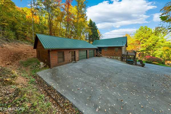 8.32 Acres of Land with Home for Sale in Sevierville, Tennessee