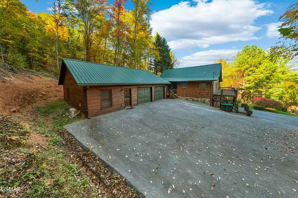 8.32 Acres of Land with Home for Sale in Sevierville, Tennessee