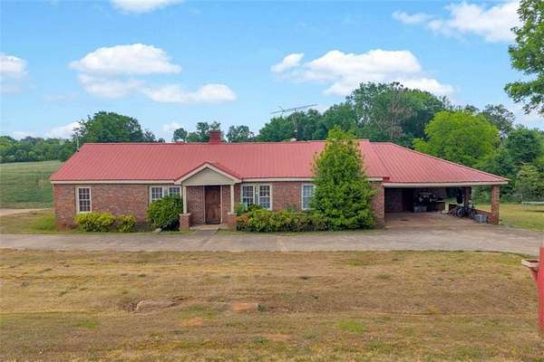 57.1 Acres of Agricultural Land with Home for Sale in Royston, Georgia