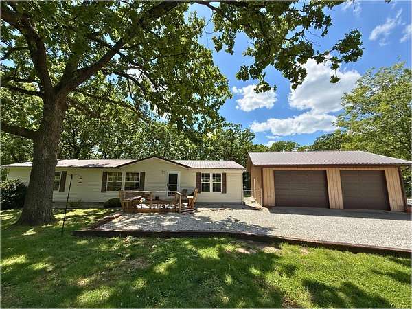 20 Acres of Recreational Land with Home for Sale in Aldrich, Missouri