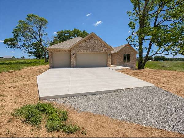 3.69 Acres of Land with Home for Sale in Gentry, Arkansas