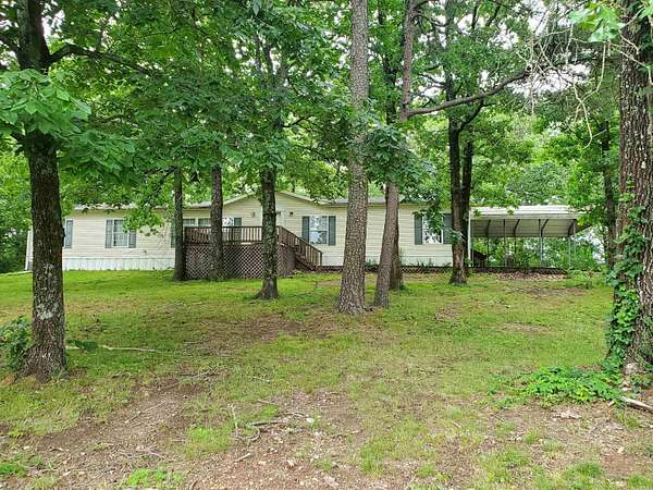 15.1 Acres of Recreational Land with Home for Sale in Mena, Arkansas