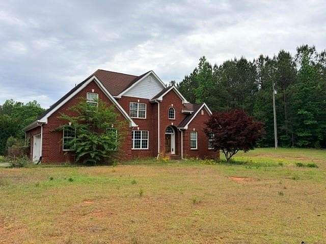2.43 Acres of Land with Home for Sale in Jackson, Georgia