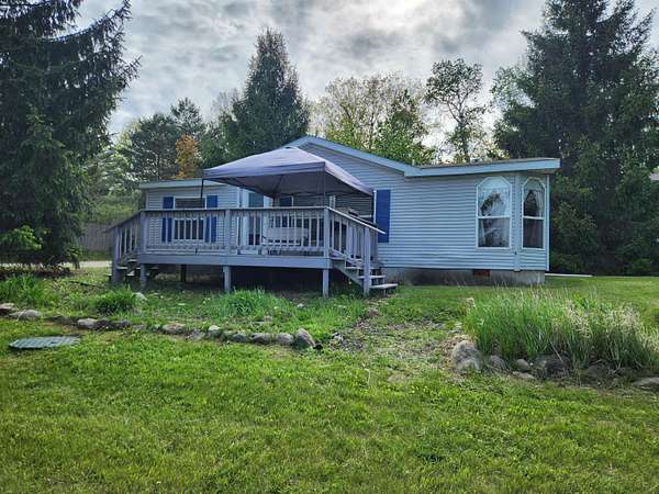2.6 Acres of Land with Home for Sale in Gladwin, Michigan